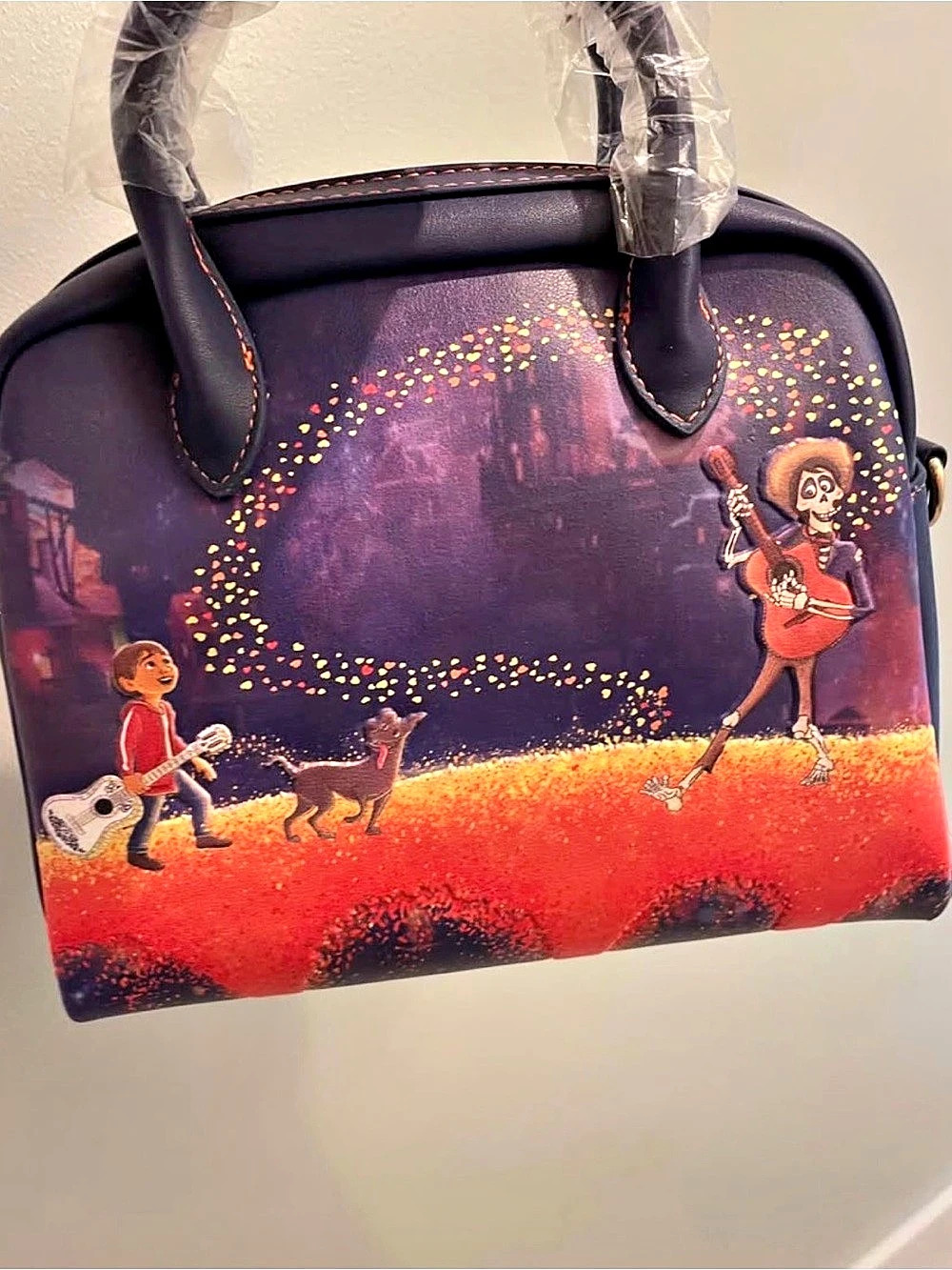Loungefly Disney Pixar Coco Marigold Bridge Guitar Strap Crossbody Bag Purple &